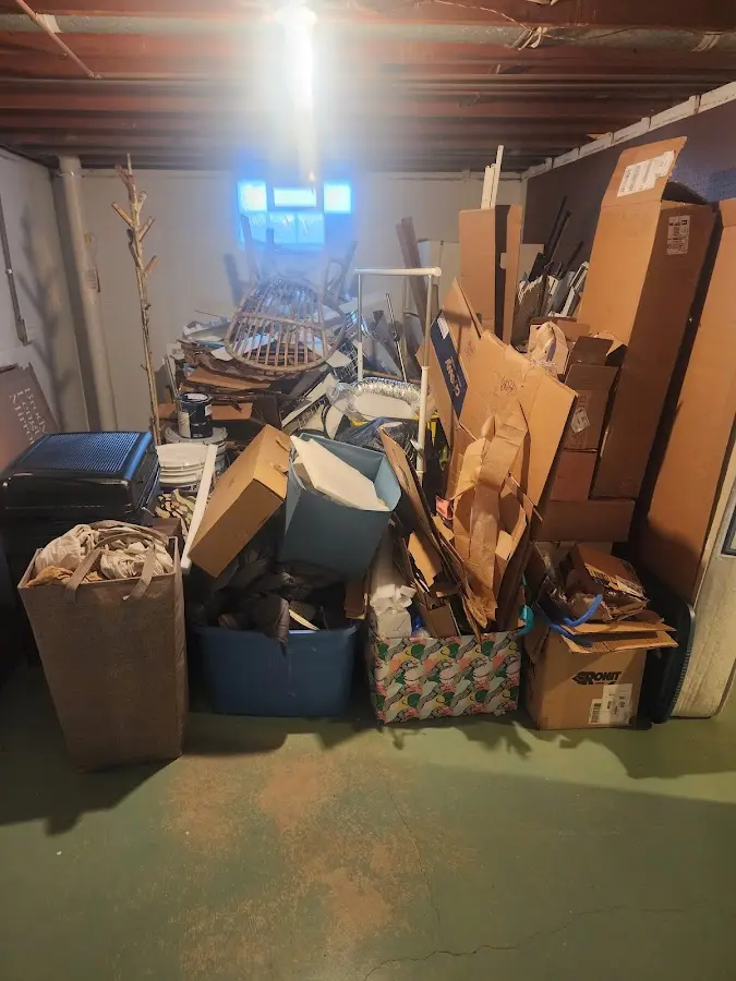 Roll-off dumpster container at job site for 2 Yard Dumpster Rental in Hutchinson Island South